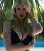 Kristy Leonie, blonde, busty, lingerie, tropical, strip, topless, pool