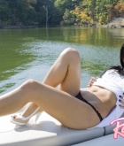 Raven Riley, brunette, latin, strip, outdoors, boat, piercing, tattoo