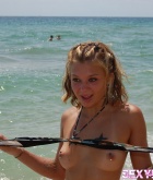 Sexy Lette, blonde, strip, bikini, piercing, tattoo, beach, outdoors