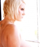 Hannah Hilton, blonde, busty, strip, piercing, tattoo, window
