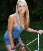 Shawna Lenee, blonde, strip, bicycle, backyard, outdoors
