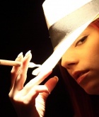 Gabriella Lupin, strip, redhead, hat, cigar, gun, table