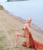 Berry, blonde, nude, pose, beach, sheet