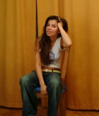 Judy, brunette, strip, jeans, chair, pose
