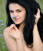 Mirela A, brunette, nude, outdoors, hay, flowers
