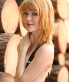 Lynette, redhead, strip, nude, perky, suspenders, wood