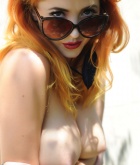 Lucy Vixen, redhead, strip, topless, busty, retro