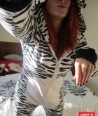 Lucy Vixen, redhead, strip, topless, busty, zebra