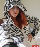 Lucy Vixen, redhead, strip, topless, busty, zebra