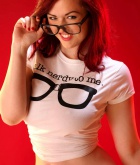 Rosie Jaye, redhead, strip, nude, busty, glasses, nerd
