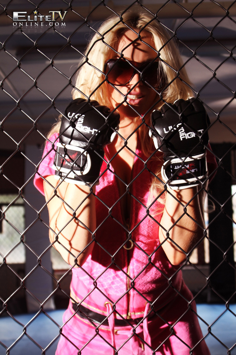 Hannah Prentice, blonde, strip, busty, cage, gloves